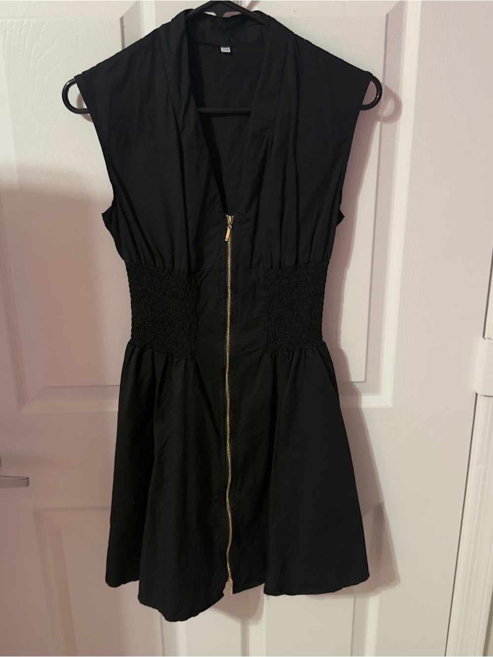 Sleek Black Zip-Front Mini Dress with Smocked Waist